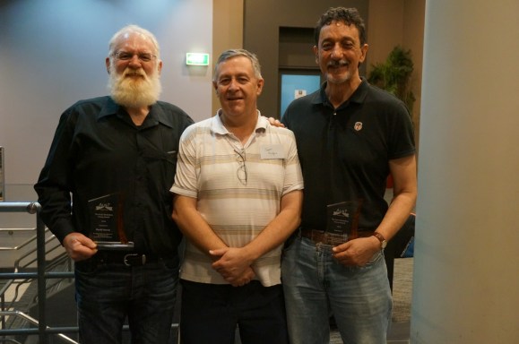 Chris Harris and Dave Morris pose with Aus7 President Trevor Hodges (centre)